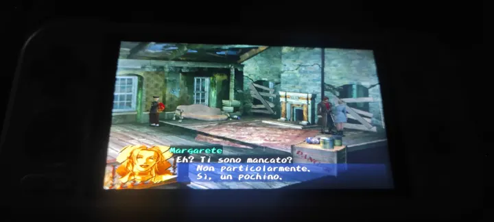 Screenshot di Shadow Hearts: Covenant con la traduzione italiana automatica: «Margarete: Eh? Ti sono mancato? / Non particolarmente. / Sì, un pochino.»